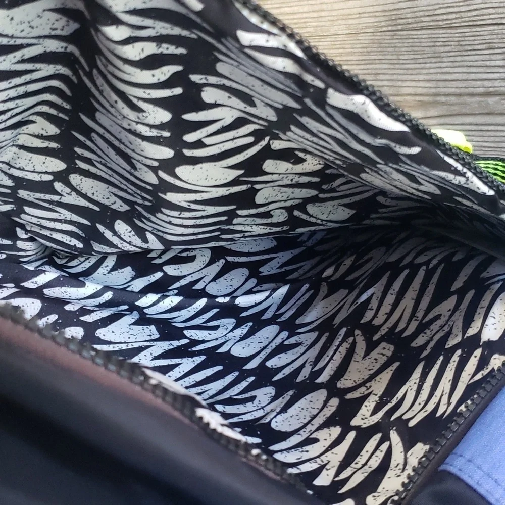 Ivivva purple and black padde backpack
